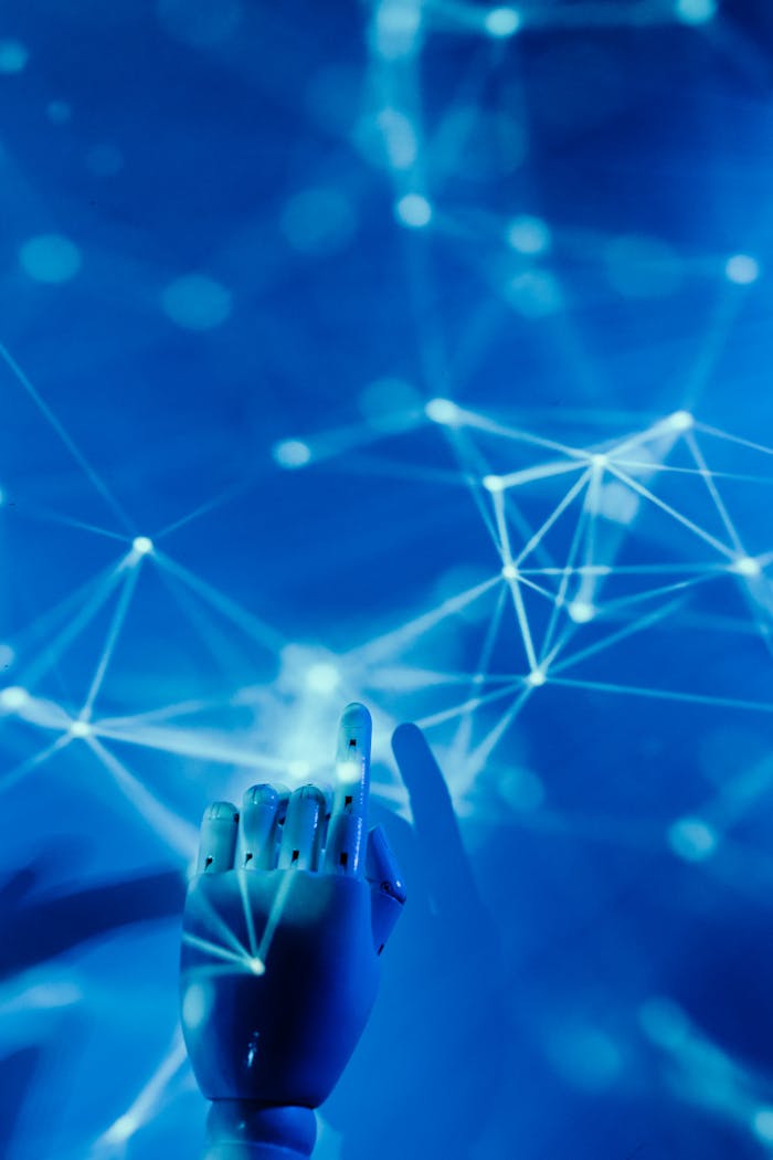 services-03 Futuristic robotic hand touching a digital network on a blue background.